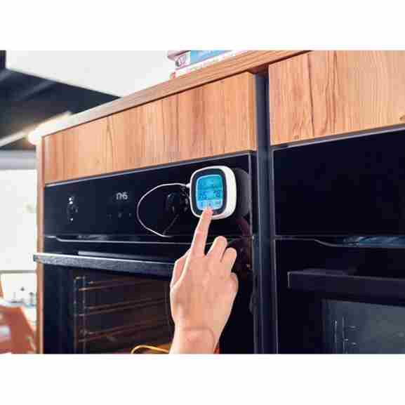 Bovenanzicht van Leifheit 3223 thermometer in wit/grijs, met opvouwbare standaard