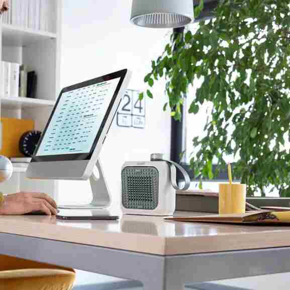 Delonghi HFX10B03.GR keramische ventilatorkachel met intuïtieve bedieningselementen en regelbare luchtstroom in groen/wit